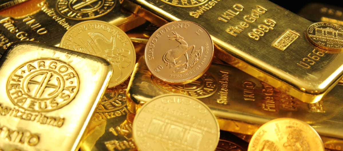 Lingotes y monedas de oro